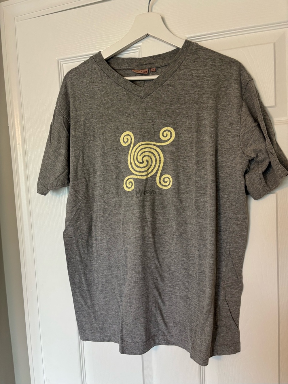 Toro Loco Gray V-Neck Short Sleeve Tee with Yellow Spiral Graphic